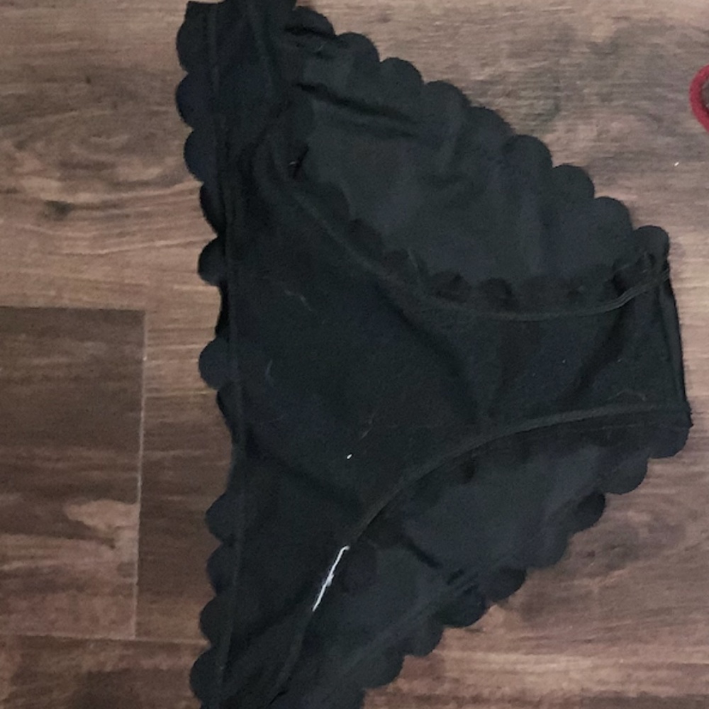 Black cheeky bathing suit bottoms